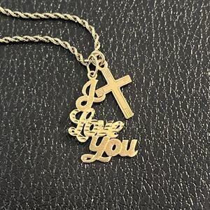 14 K solid gold pendant lot with 10 K gold chain bundle just above melt value